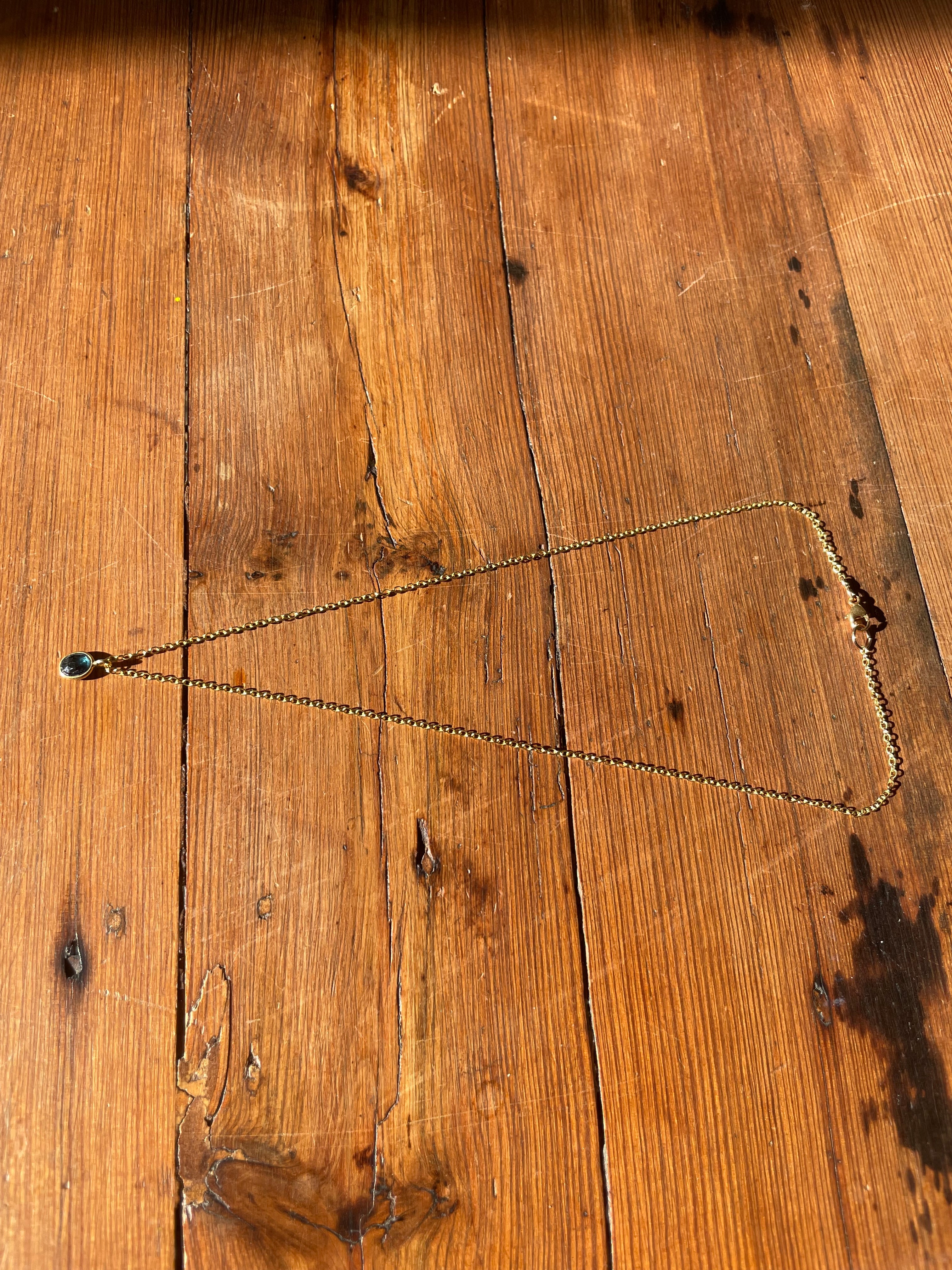 Deep Current
Blue Tourmaline Drop Necklace